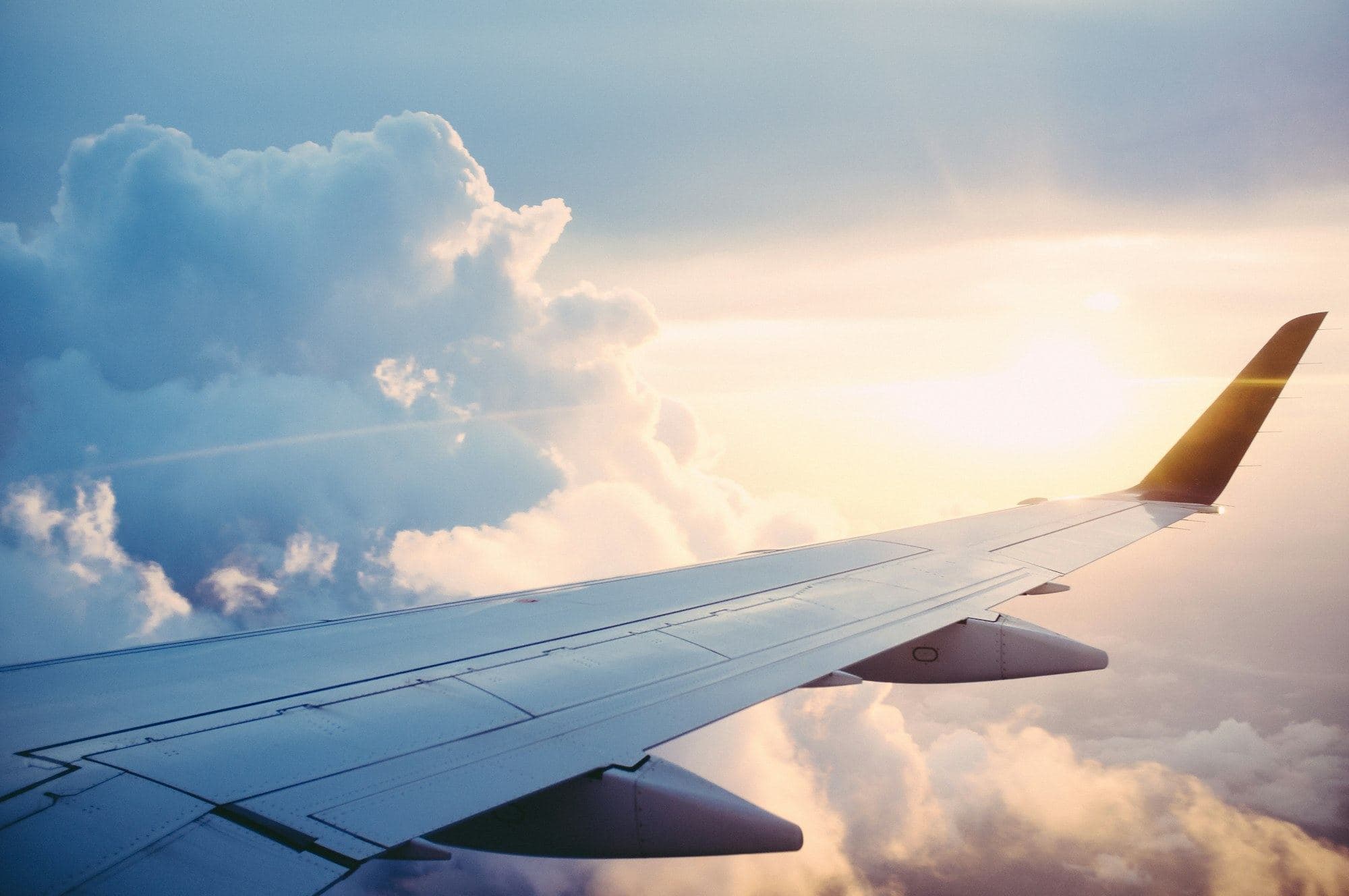 A wing above cloud at altitude